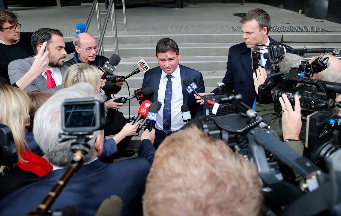 Abuse survivor Daniel Feenan talks to media outside Newcastle Local Court