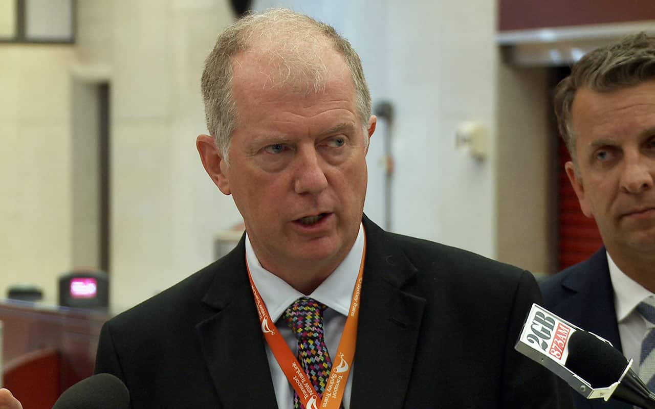 Head of Sydney Trains Howard Collins speaks to the media at Martin Place train station in Sydney, Wednesday, January 10, 2018.