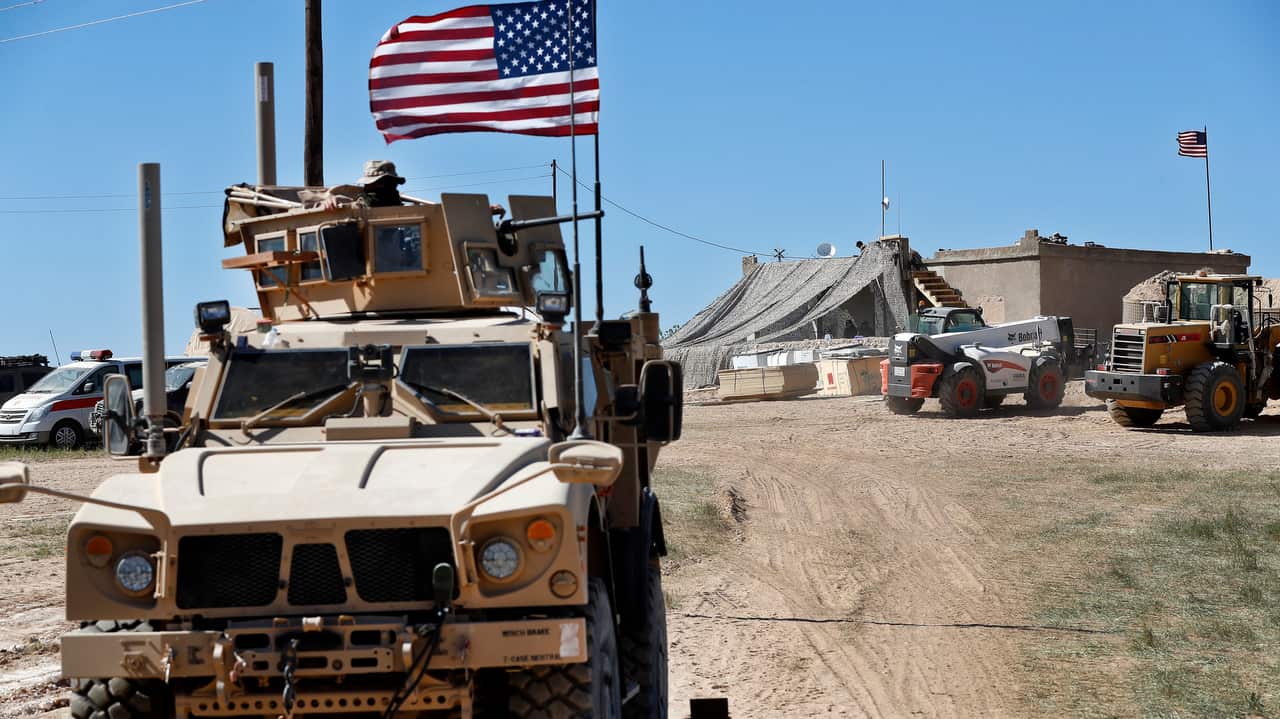 Soldiers near the front line between the US-backed Syrian Manbij Military Council and the Turkish-backed fighters, in Manbij, north Syria. 
