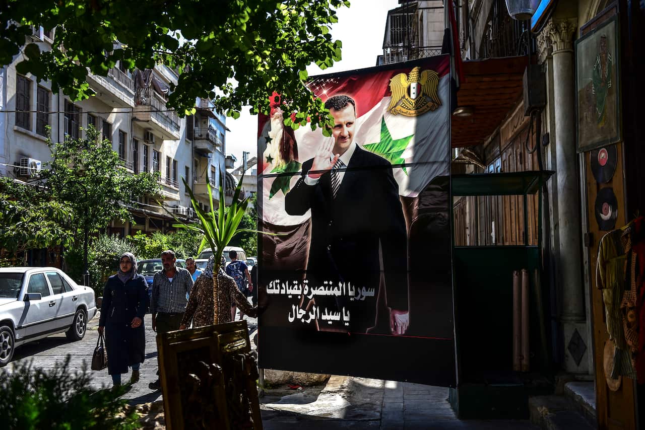 A banner of President Bashar Assad of Syria in Damascus, June 24, 2019. (Meridith Kohut/The New York Times)