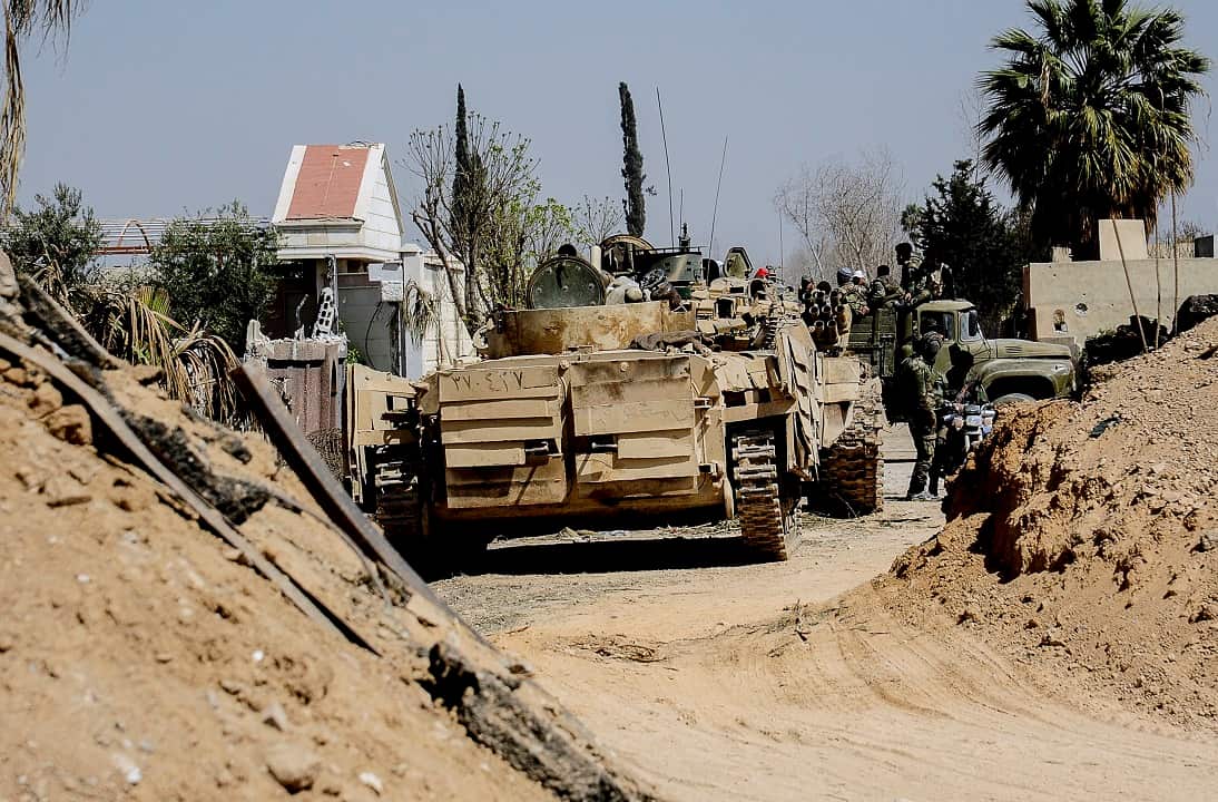 Syrian Arab Army armoured units advance during military operations against Jabhat al-Nusra terrorist organisation and affiliated groups in the Eastern Ghouta.