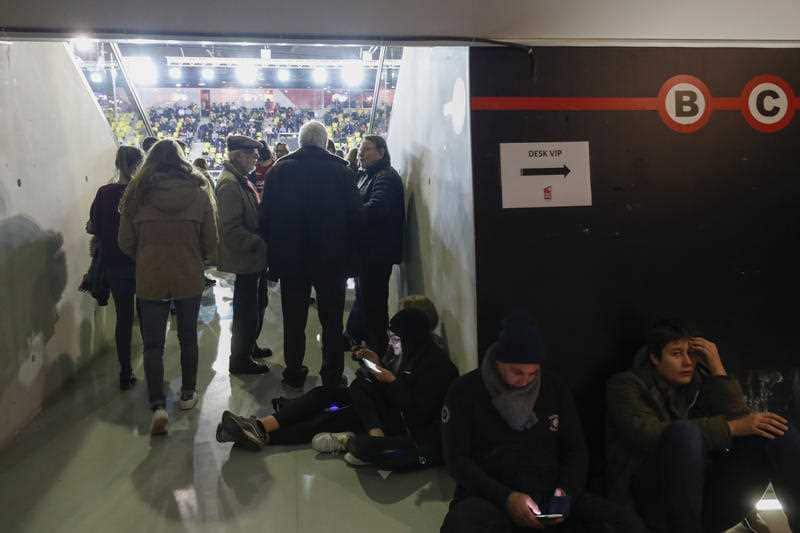 Basket ball supporters wait to leave after a match at the Rhenus Sport stadium in Strasbourg, eastern France.