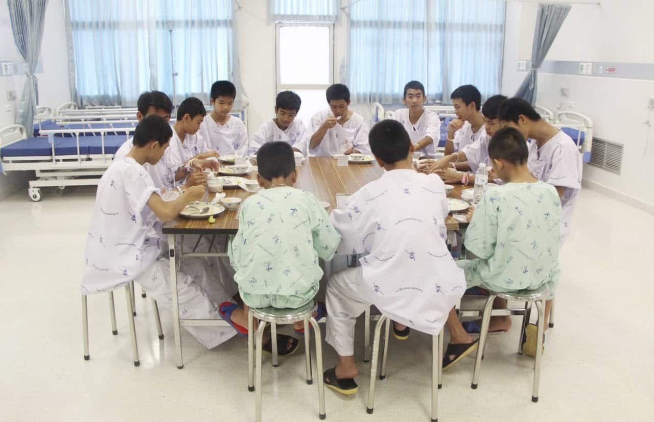 The 12 boys and their soccer coach rescued after being trapped in a flooded cave in northern Thailand are recovering well 