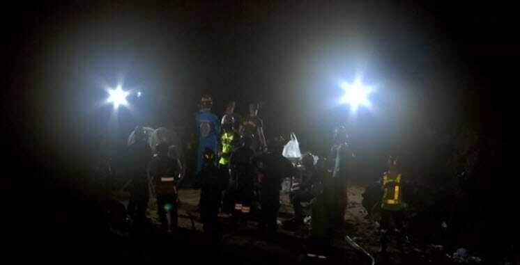  The children entered the cave with their coach on Saturday. 