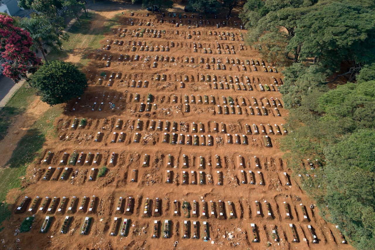The graves of recently buried fill Vila Formosa cemetery (AAP)