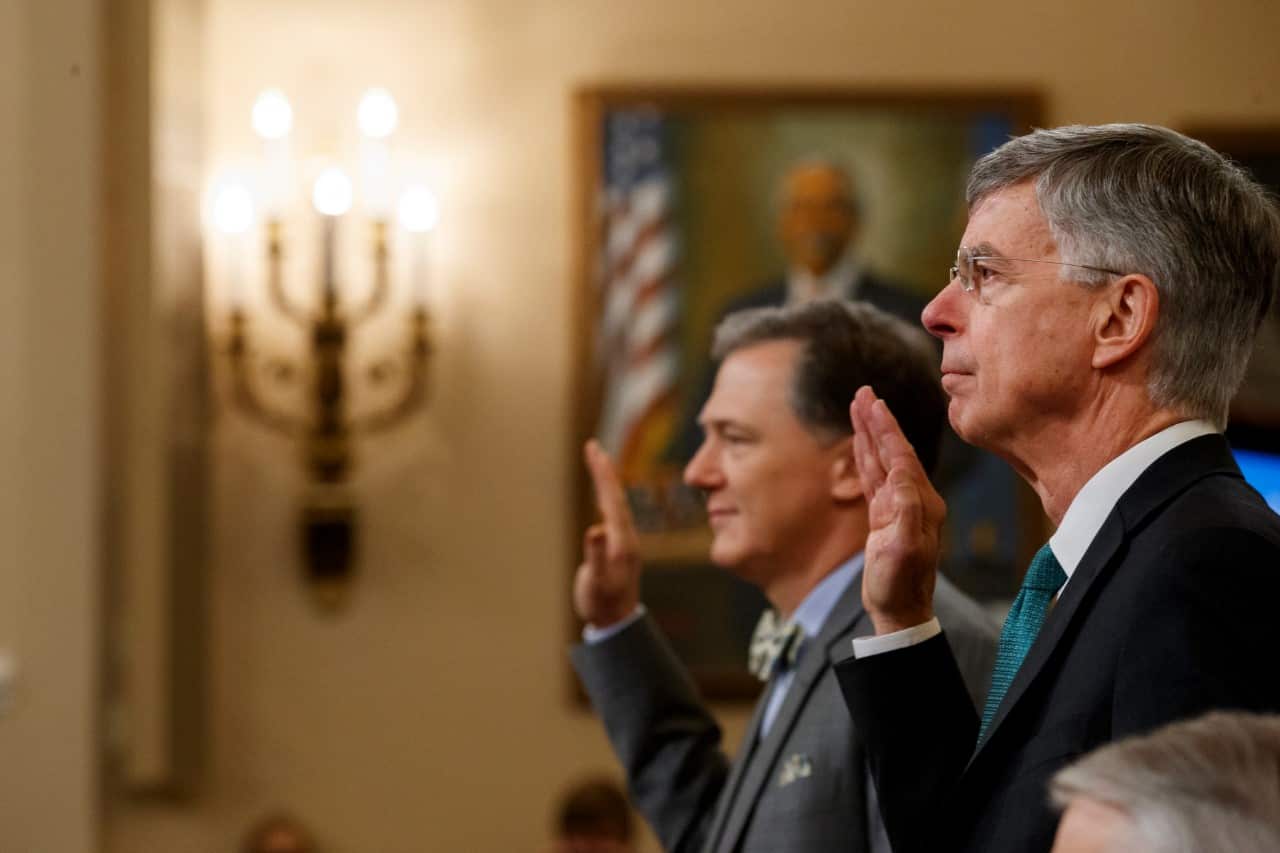 Top US diplomat in Ukraine William Taylor (r) and Foreign Service officer George Kent are sworn in to testify