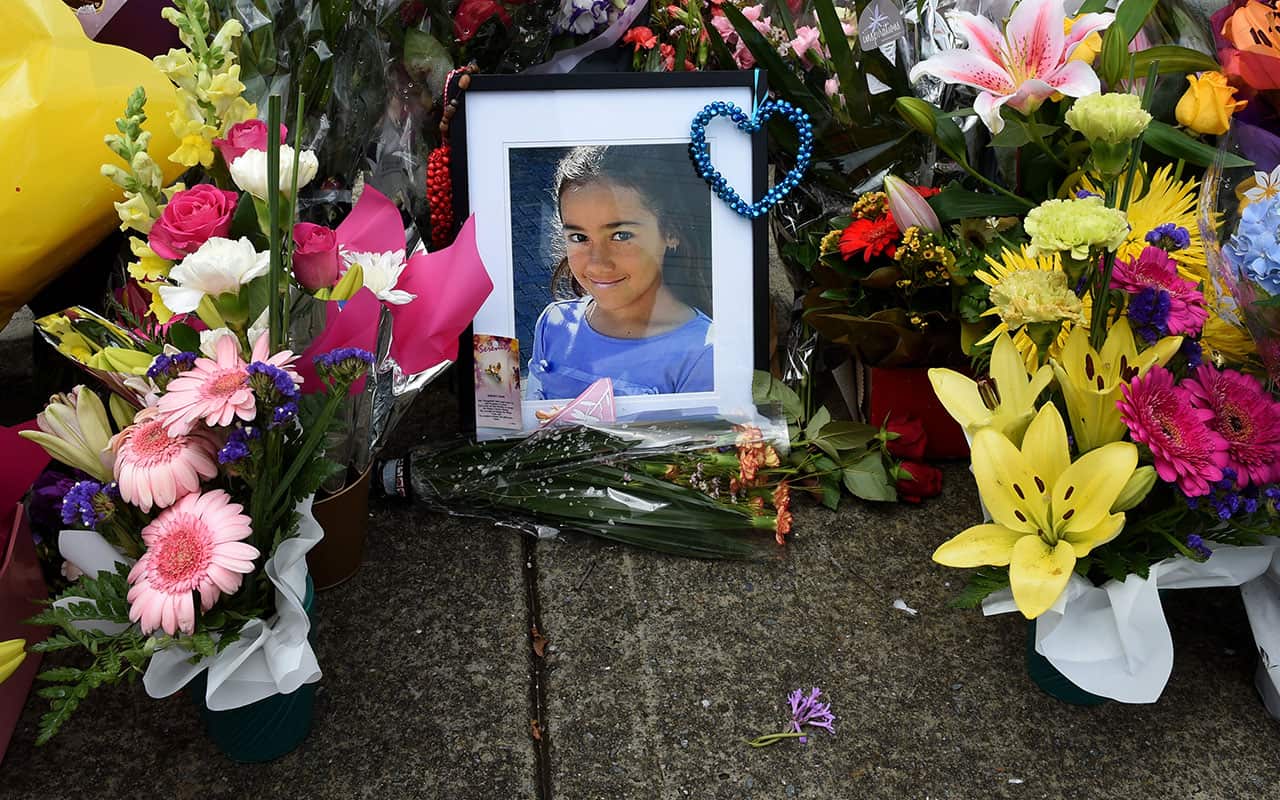 A floral tribute to Tia Palmer at the gates of Marsden State High School in Logan, Brisbane, Monday, Nov. 9, 2015.