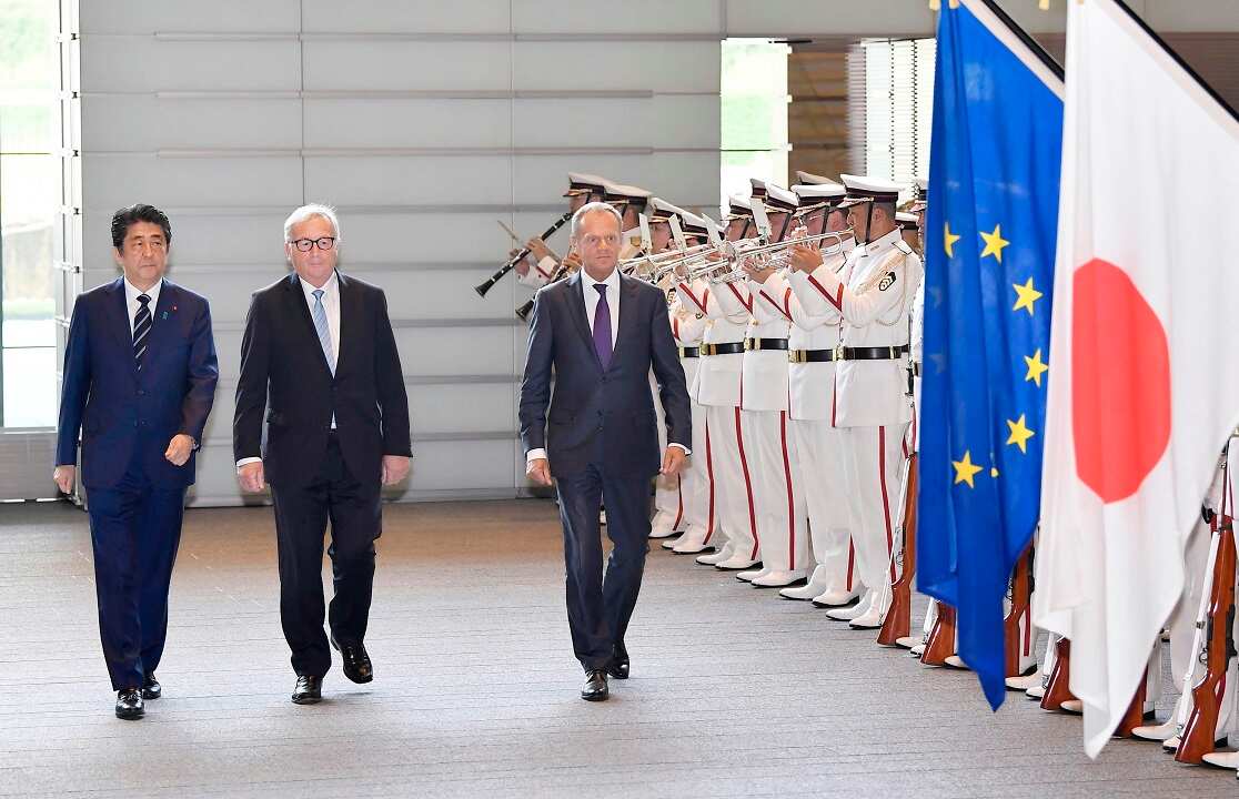 European Commission President Jean-Claude Juncker, European Council President Donald Tusk and Japanese Prime Minister Shinzo Abe.