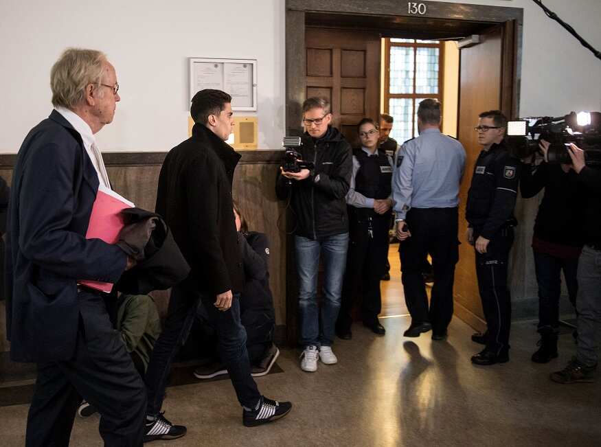 Borussia Dortmund's Marc Bartra arrives to testify in a trial in Dortmund