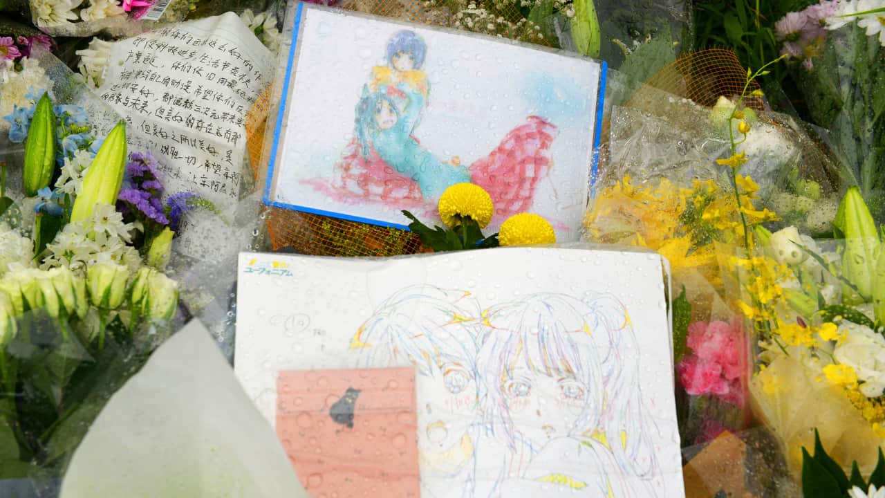 A photo of some letters to victims that were placed near the building.