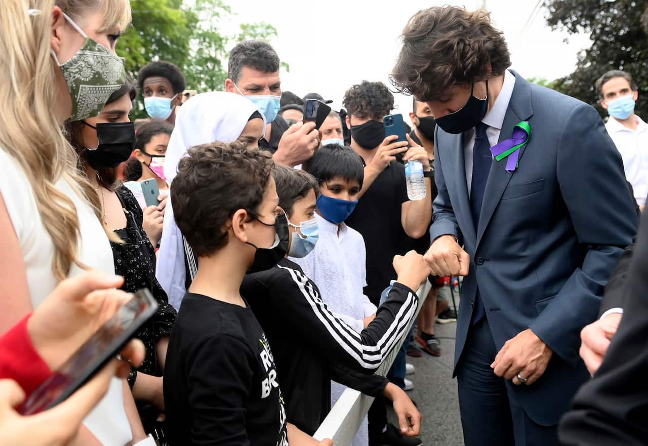 Prime Minister Justin Trudeau greets mourners at a vigil for the victims of the deadly vehicle attack.