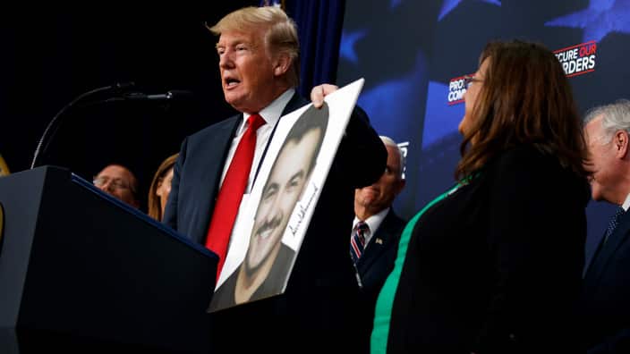 President Donald Trump speaks about immigration alongside family members affected by crime committed by undocumented immigrants.