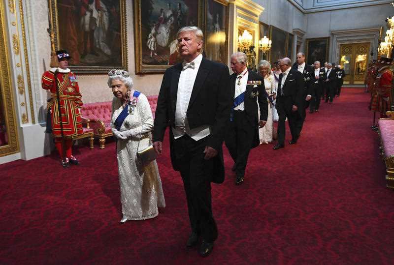 Britain's Queen Elizabeth II, centre left and US President Donald Trump during an earlier state dinner. 