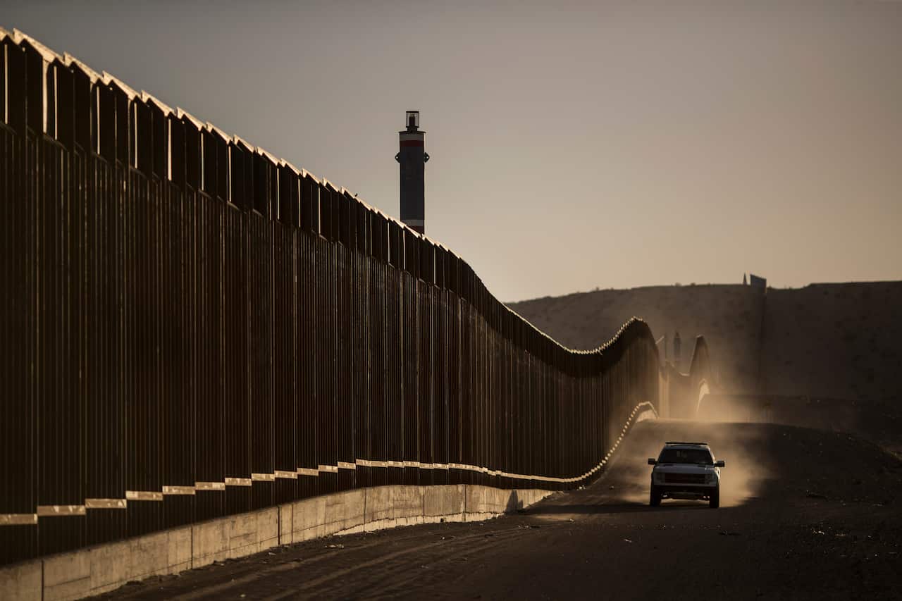 A Border Patrol vehicle drives along the border fence in Sunland Park, N.M., across from Ciudad Juarez, Mexico, June 24, 2018.