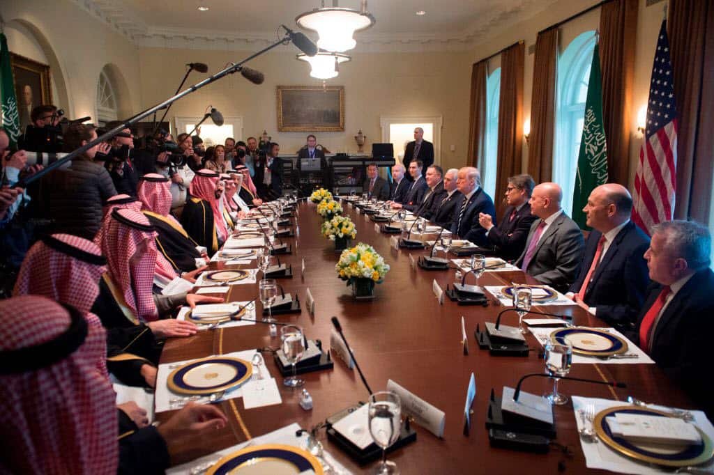 US President Donald Trump (center R) holds a lunch meeting with Saudi Arabia's Crown Prince Mohammed bin Salman (center L), and members of his delegation