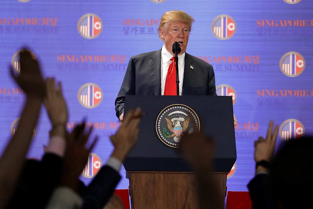 U. S. President Donald Trump answers questions about the summit with North Korea leader Kim Jong Un during a press conference at the Capella resort on Sentosa Island Tuesday, June 12, 2018 in Singapore. (AP Photo/Evan Vucci)