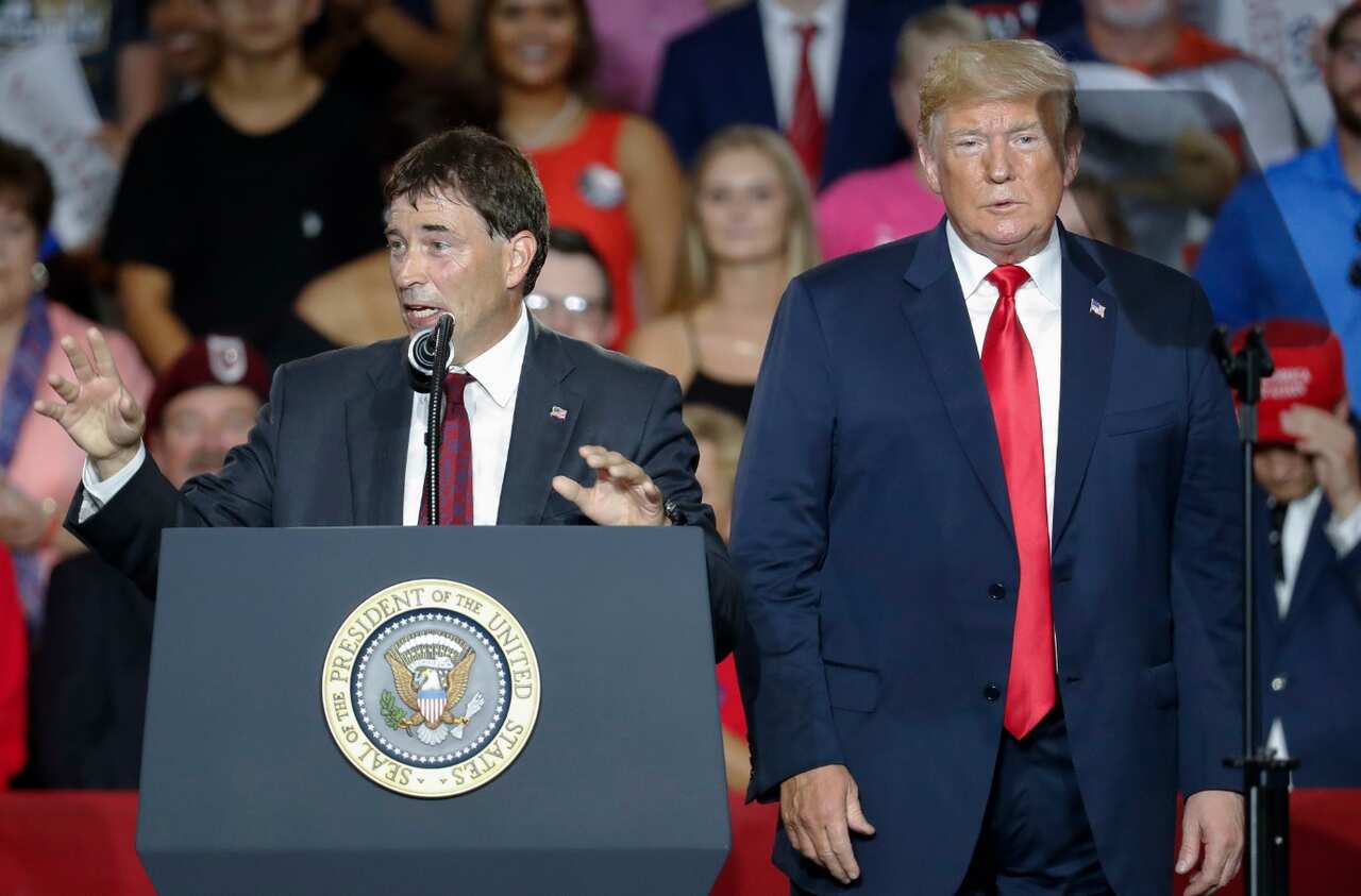 President Donald Trump, right, stands beside 12th Congressional District Republican candidate Troy Balderson, left, during a rally, Saturday, Aug. 4, 2018