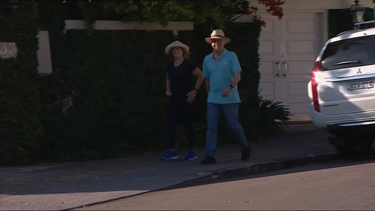 Malcolm Turnbull was all smiles as he went for a stroll with wife Lucy. 
