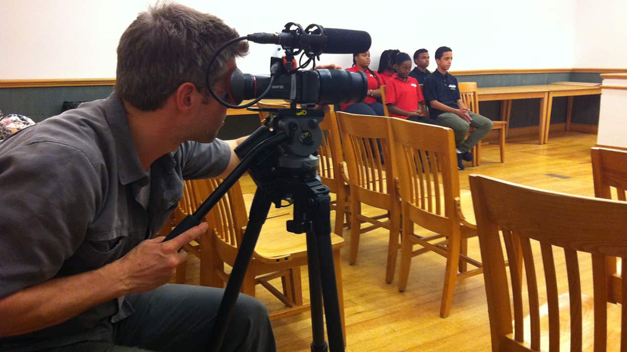 Dateline's Aaron Lewis films the Youth Court in action.