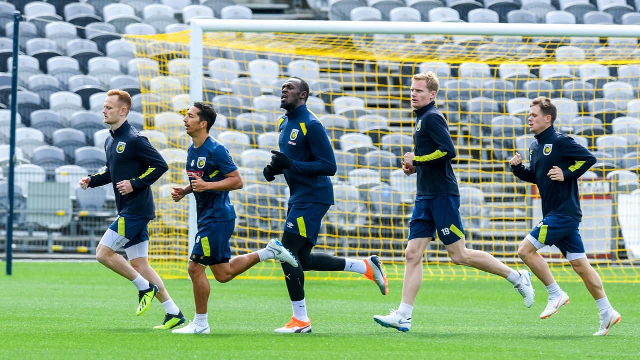 Eight-time Olympic sprinting gold medalist Usain Bolt (centre) is seen during a training session.