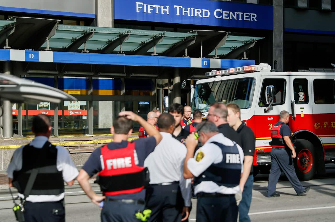 Emergency personnel and police respond to reports of an active shooter situation near Fountain Square, Thursday, Sept. 6, 2018, in downtown Cincinnati.