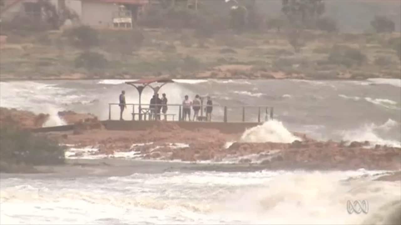 Destructive winds and heavy rain are forecast to continue for a 12-hour period.