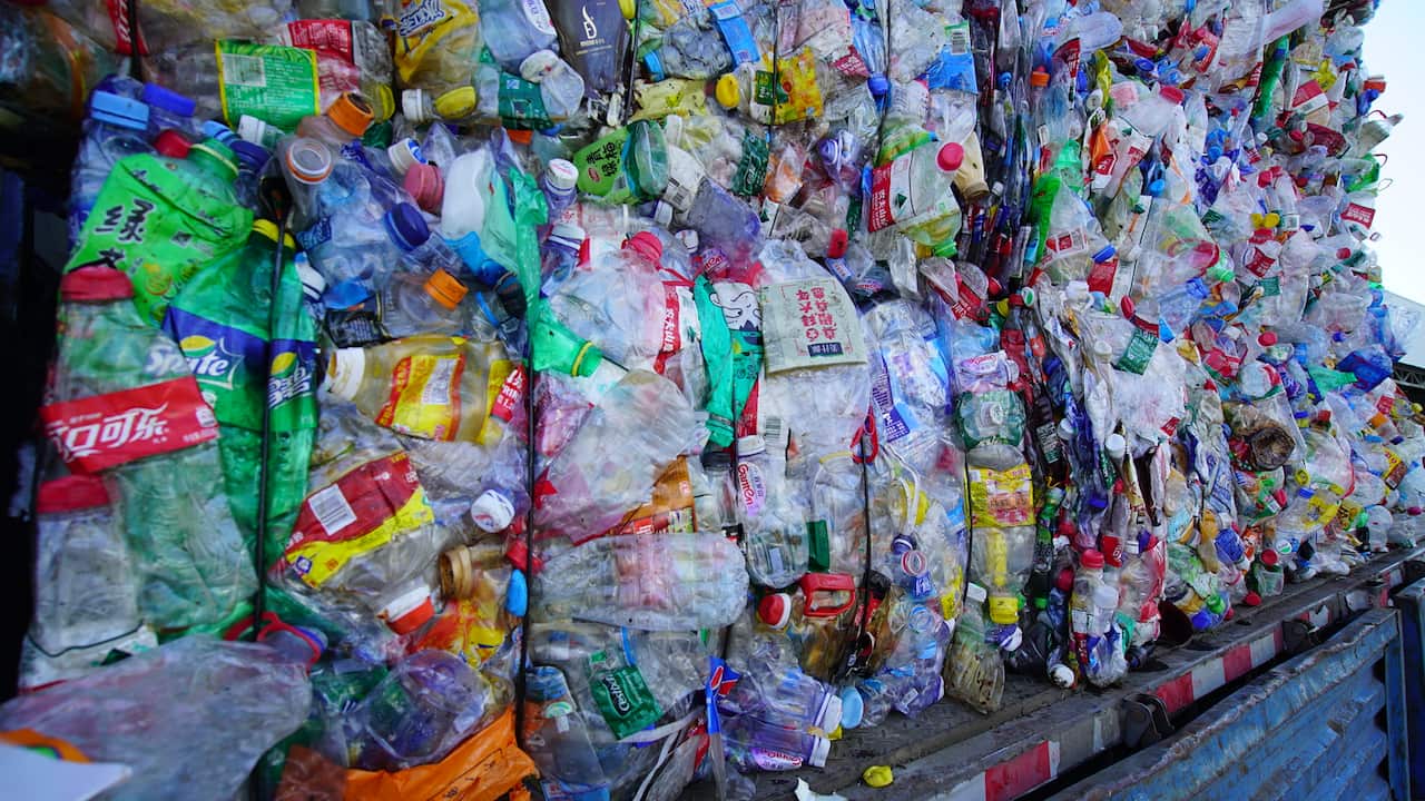 Plastic bottles are processed in China