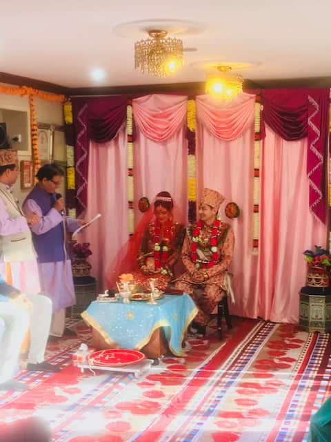 Hindu Priest Narayan Bhatt's offers these small wedding services in a makeshift temple at the back of his home, in Sydney's west.