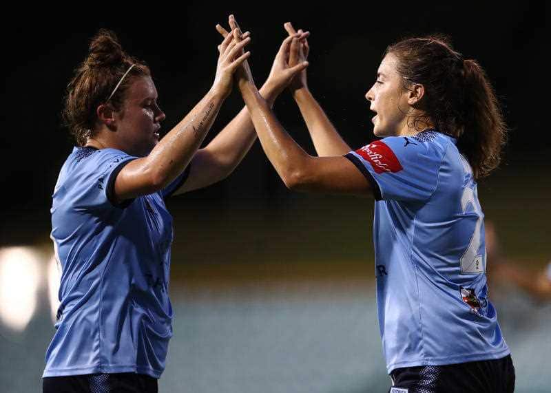Sofia Huerta of Sydney celebrates with team mate Savannah McCaskill after scoring a goal.