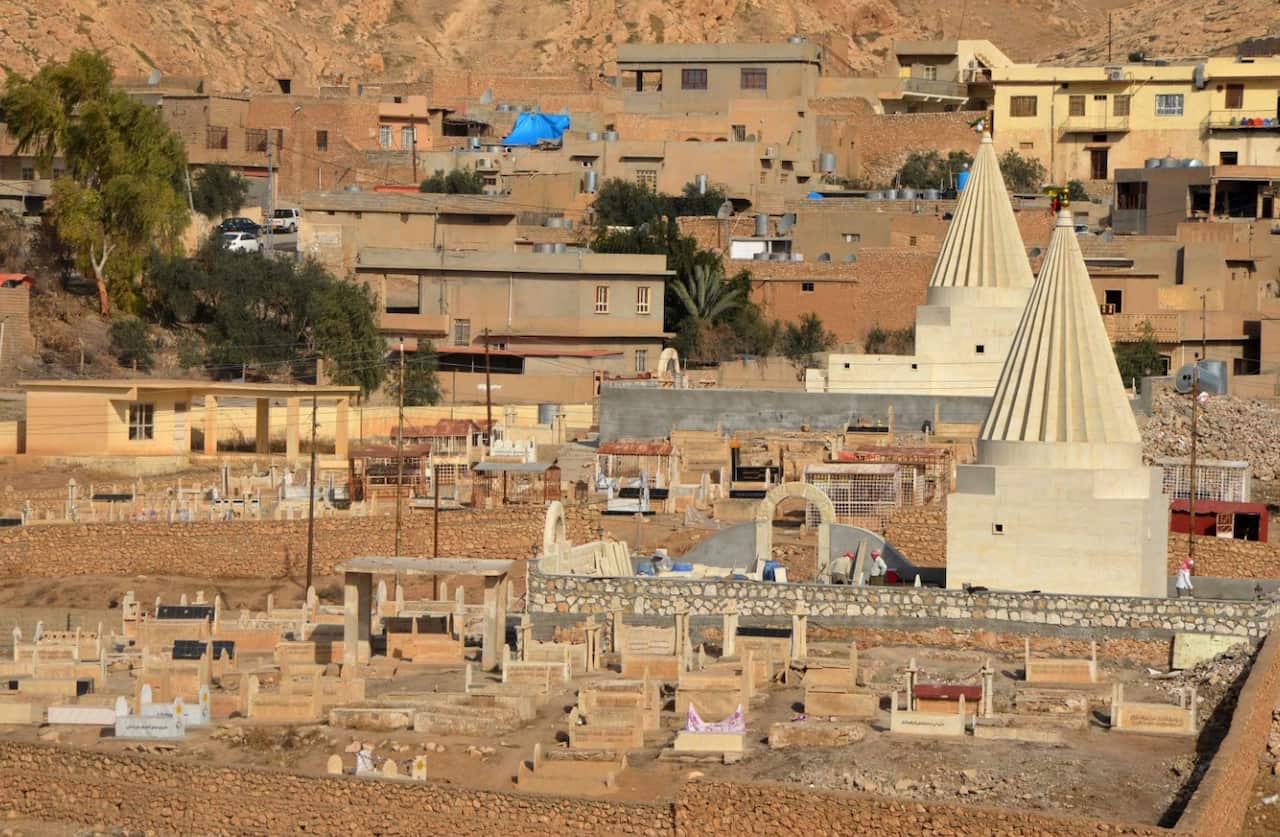 A general view shows rebuilt Yazidi temples on January 12, 2018, in the town of Bashiqa, some 20 kilometres north east of Mosul.