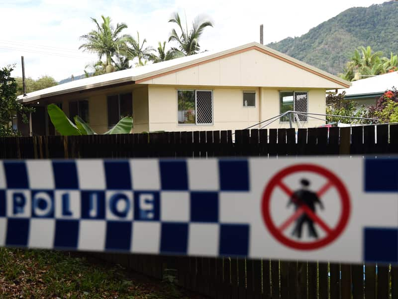 Police tape is seen around a house in which eight children were murdered in the Cairns suburb of Manoora, Saturday, Dec. 20, 2014. Their mother, who was taken hospital with stab wounds, has been arrested for murder. (AAP Image/Dan Peled) NO ARCHIVING