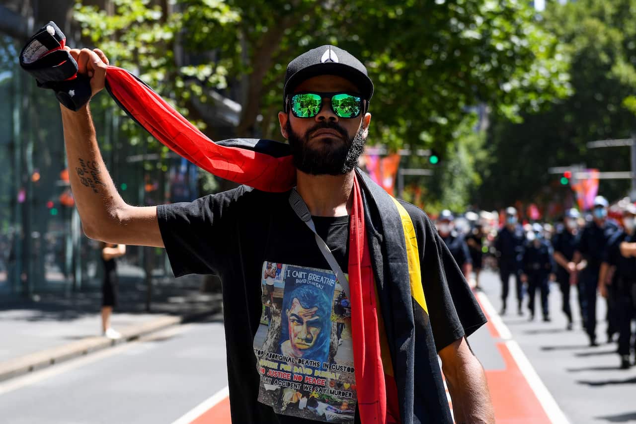 Paul Silva, a nephew of David Dungay Jr, is seen during an Invasion Day rally, in Sydney, Wednesday, January 26, 2022 (AAP Image/ NO ARCHIVING