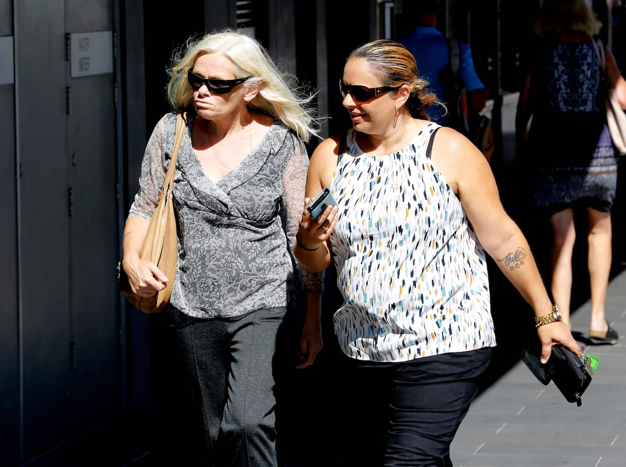 Rebecca Maher's mother Debbie Small, left, arrive at Newcastle Court for the inquest into her daughter's death.