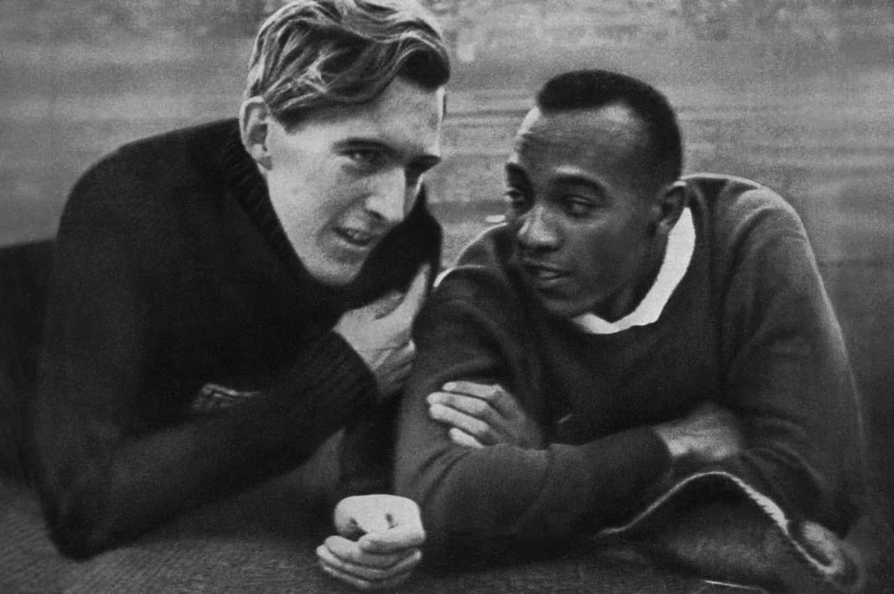 US champion Jesse Owens (R) and German c