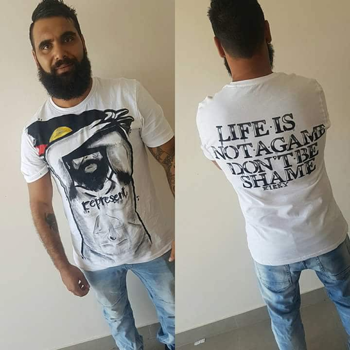 Indigenous youth worker Josh Kirk wearing t-shirts to break down the “shame” associated with suicide.  