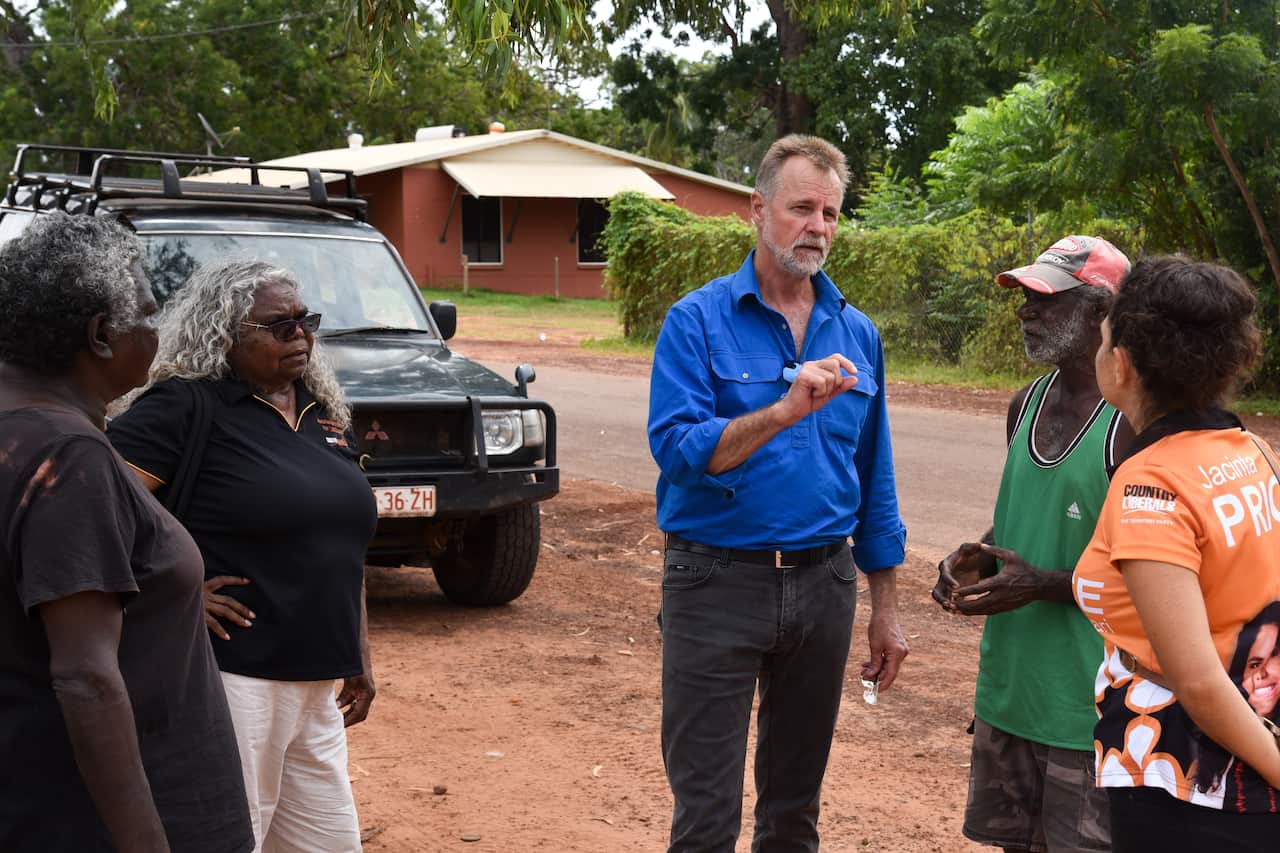 Indigenous Affairs Minister Nigel Scullion speaks to locals in the Tiwi Islands, Northern Territory, on Wednesday, 1 May 2019. 