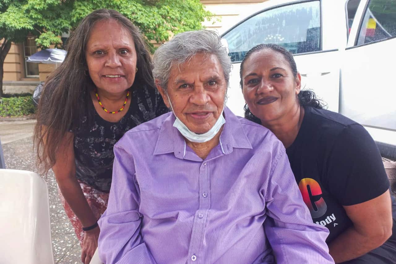 uncle_desmond_sandy_yuggera_elder_purple_shirt_in_middle_aunty_debbie_sandy_yuggera_organiser_regina_bonner_organiser.jpeg