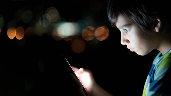 Boy using phone
