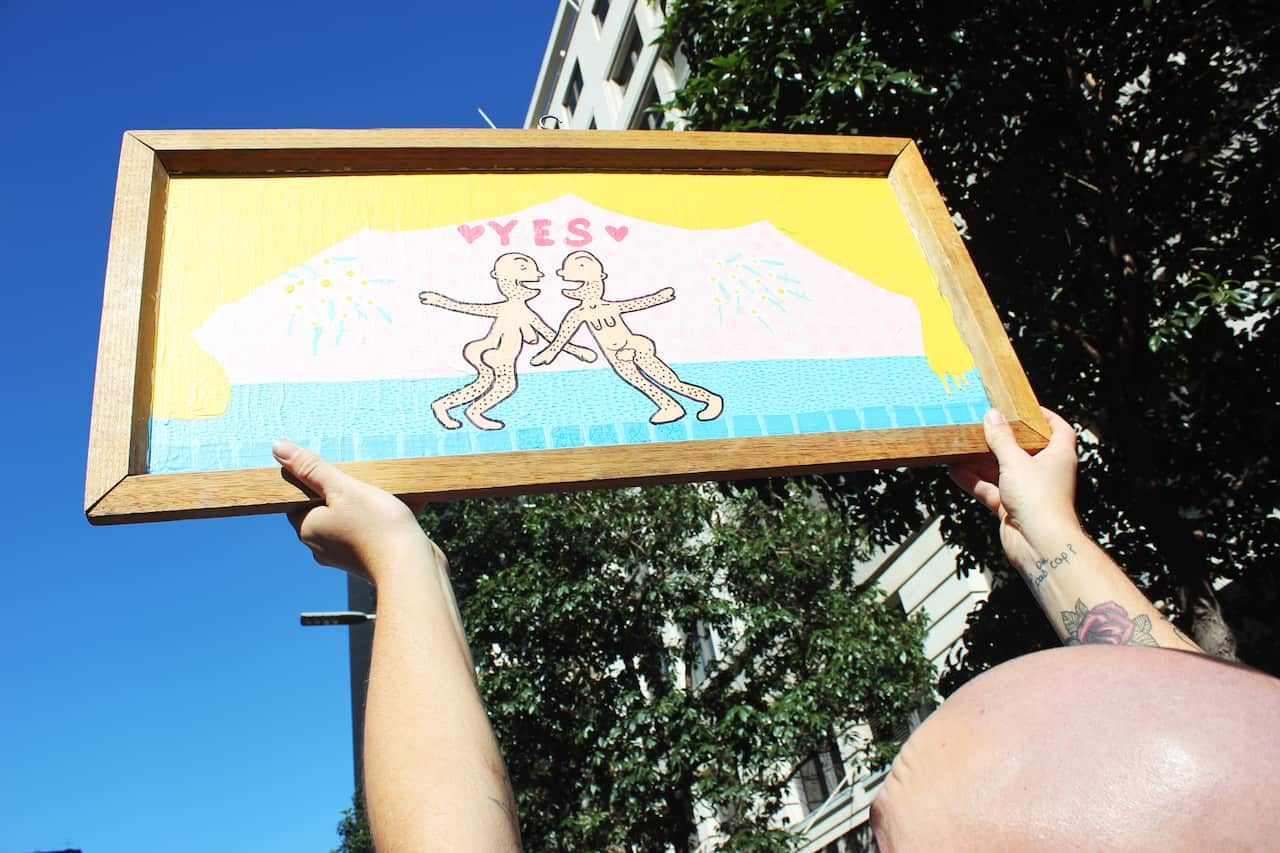 'Yes!' sign by Samuel Leighton-Dore at Sydney Marriage Equality rally on September 10th, 2017. (Photo: Chloe Sargeant / SBS)