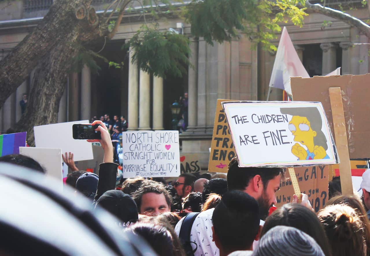 'The children are fine' sign at Sydney Marriage Equality rally on September 10th, 2017. (Photo: Chloe Sargeant / SBS)