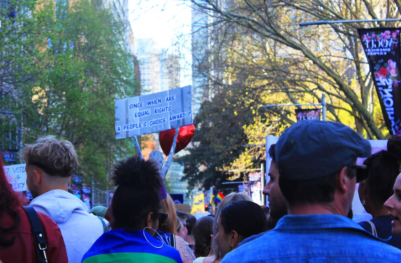 'Since when are equal rights a People's Choice award?' sign at Sydney Marriage Equality rally on September 10th, 2017. (Photo: Chloe Sargeant / SBS)