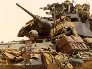 A US Marine soldier sits alert in a tank before going to combat, at camp Dwyer in the south of Helmand Province, southwest of Kabul, Afghanistan. (Getty)