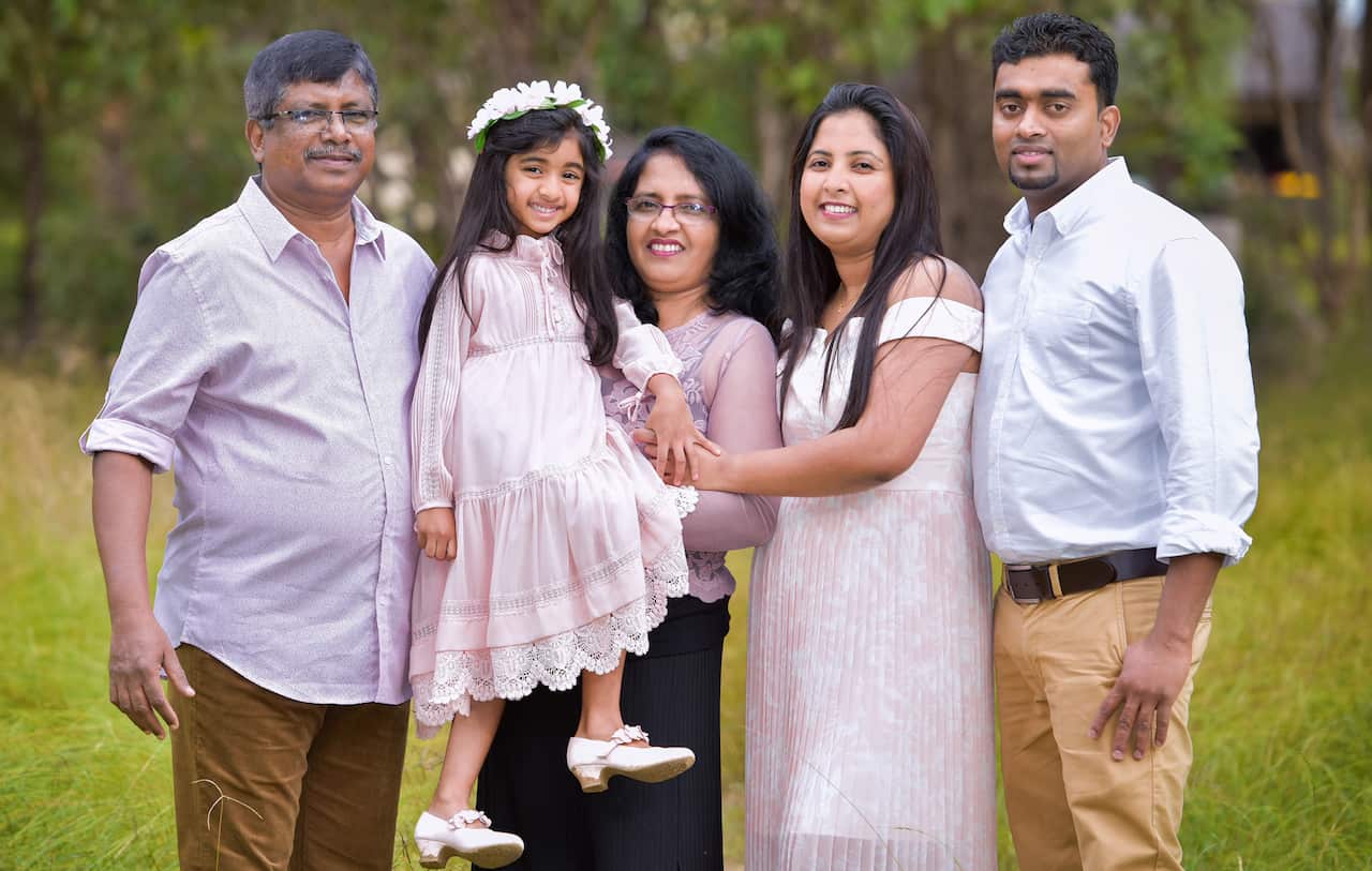 "Mr.Greshan Weerasinghe (L) with his wife and his daughter's family","title":"Mr.Greshan Weerasinghe (L) with his wife and his daughter's family","