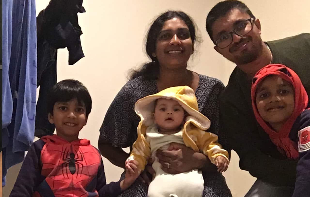 Mr.Randika Wickramasekara (R) with his wife and three children in Queensland