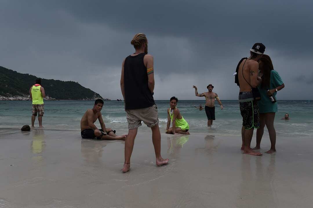 Tourists have fled the island of Koh Phangan with heavy rains and wind forecast.