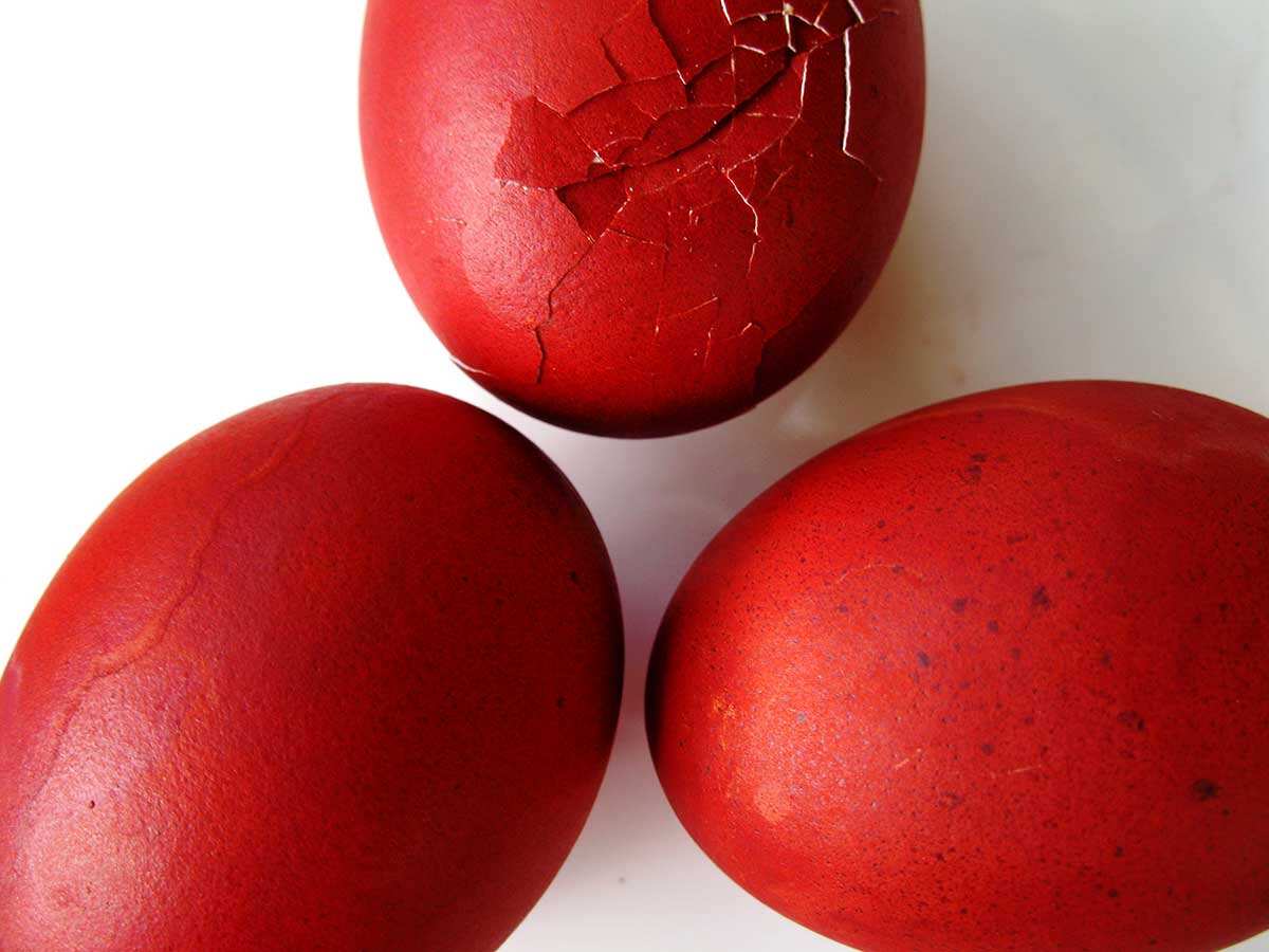 Cracked red dyed Easter eggs