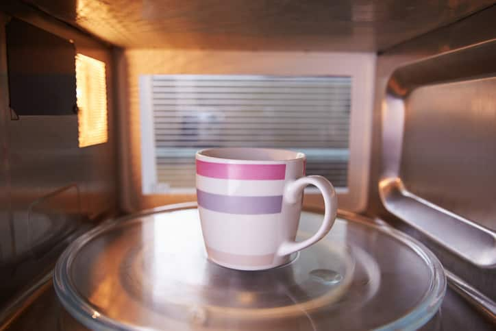 Warming cup of tea in microwave