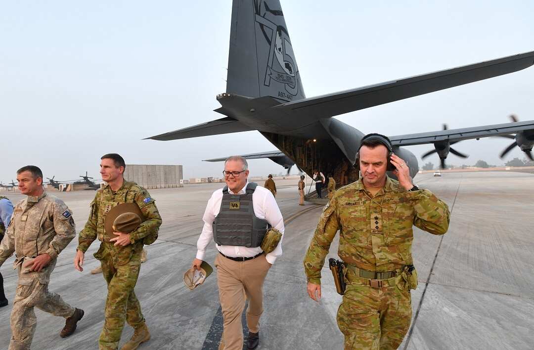 Australian Prime Minister Scott Morrison is seen during a visit to Task Group Taji at Taji Military Complex in Iraq, Wednesday, December 19, 2018. (AAP Image/David Mariuz) NO ARCHIVING