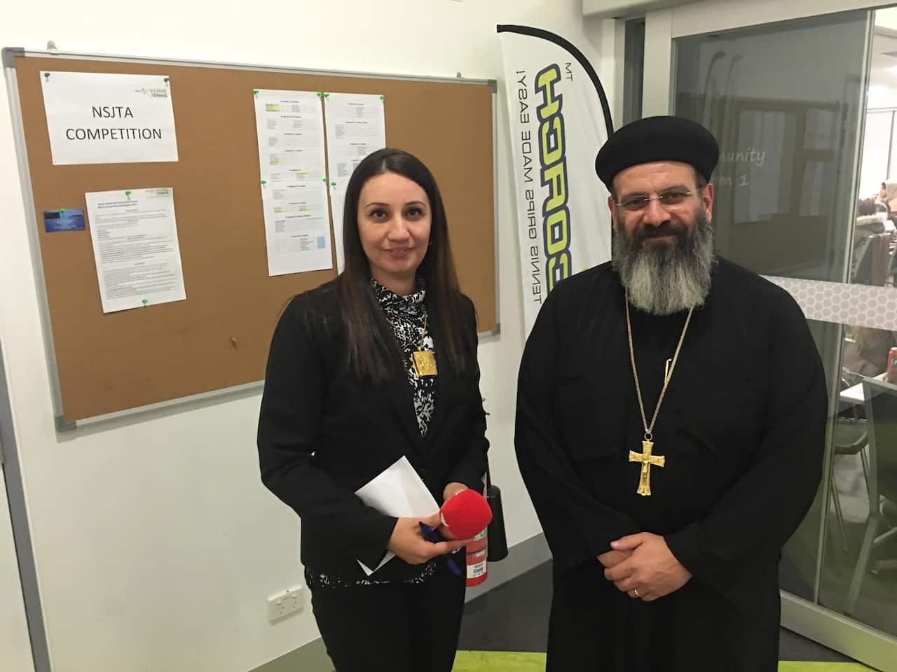 Father Makarios Wehbe with Manal Al-Ani