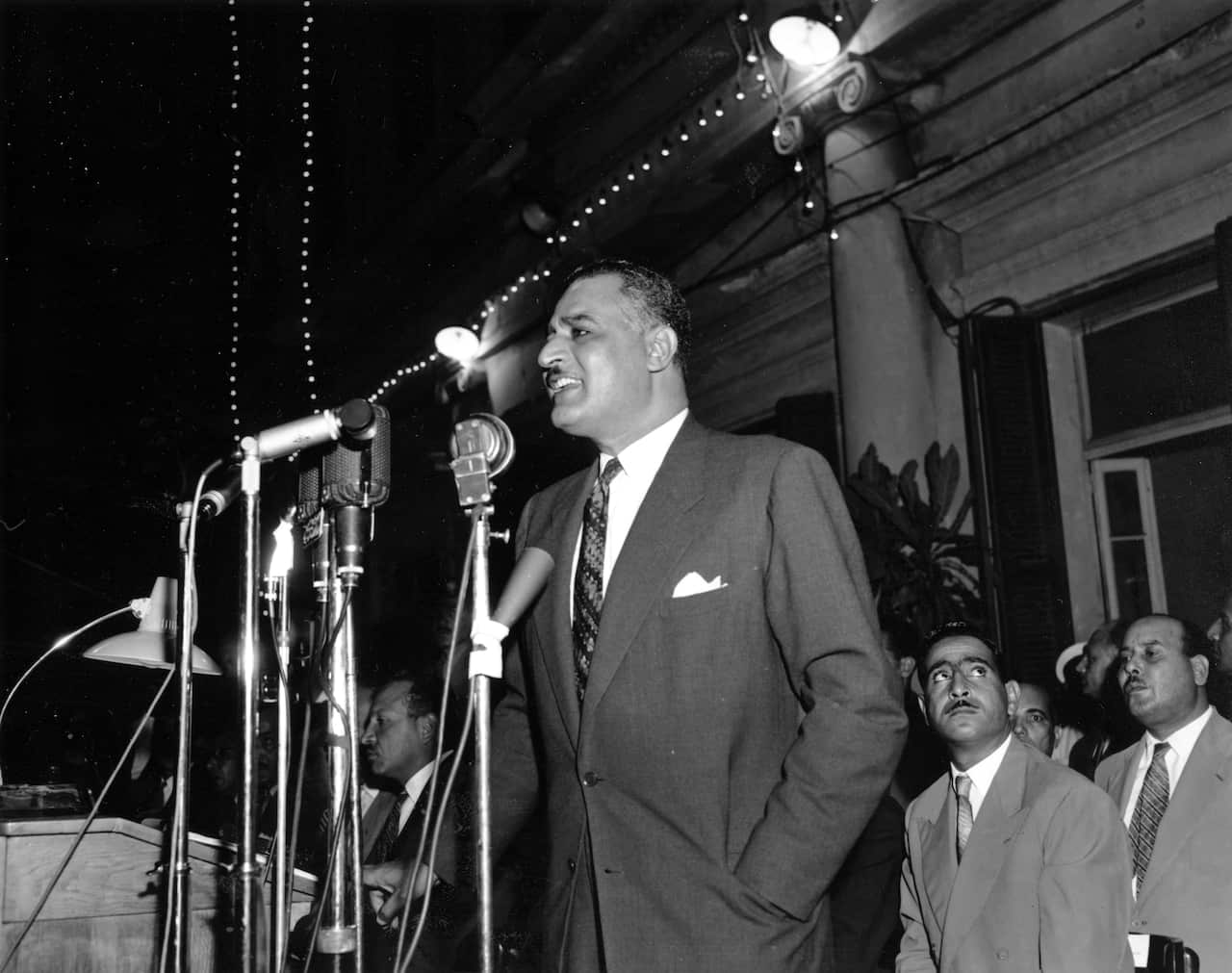Egyptian President Gamal Abdel Nasser delivers a speech on the fifth anniversary of the overthrow of King Farouk at Liberation Square in Alexandria, Egypt on July 26, 1957. (AP Photo/Raoul Fornezza)